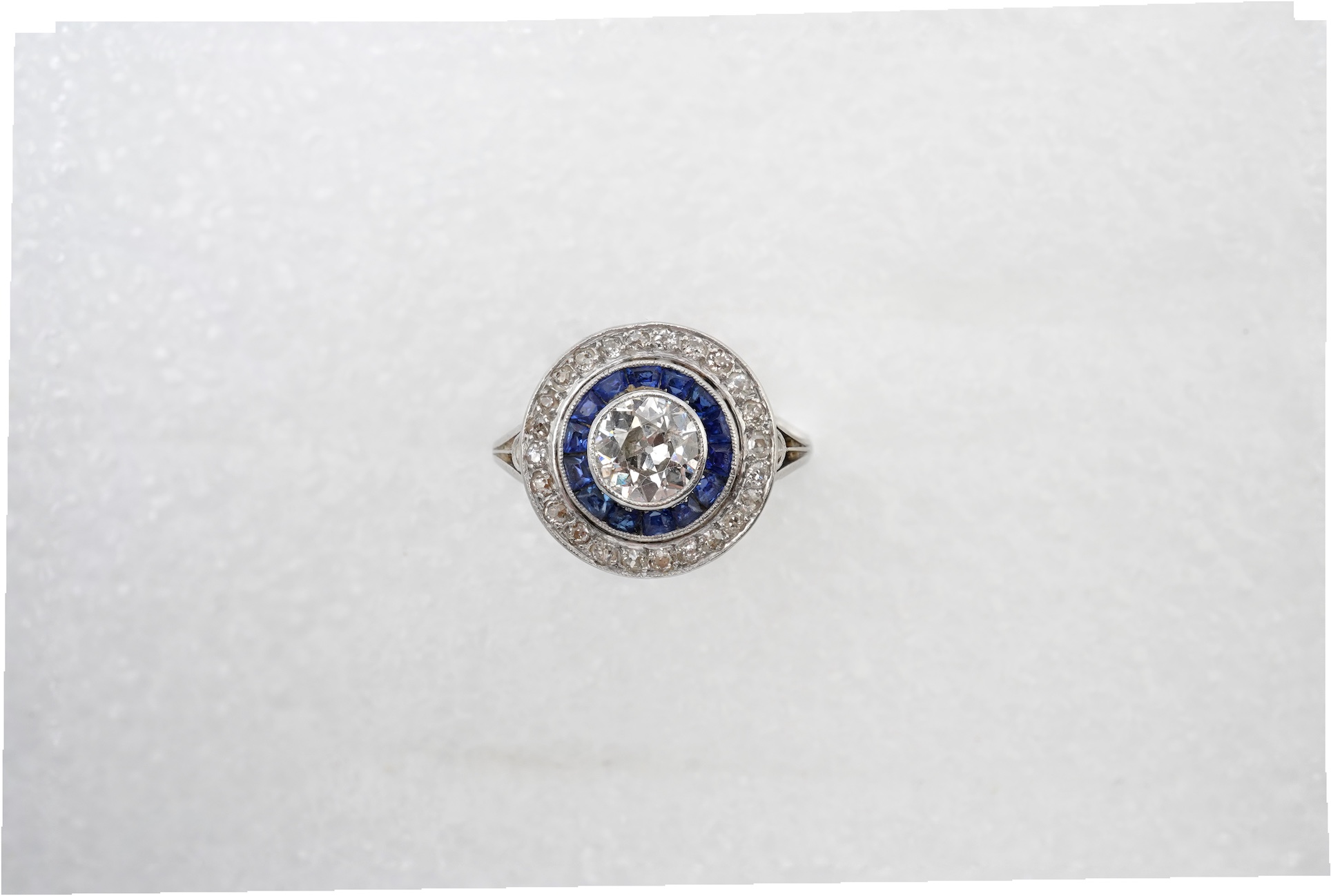 A diamond and sapphire 'target' ring
